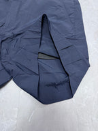 Navy Dior shorts interior seam and curved hem