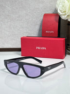 Prada sunglasses with black frames and purple-tinted lenses