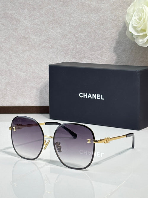 Celine round sunglasses with dark purple lenses and gold-tone metal frames