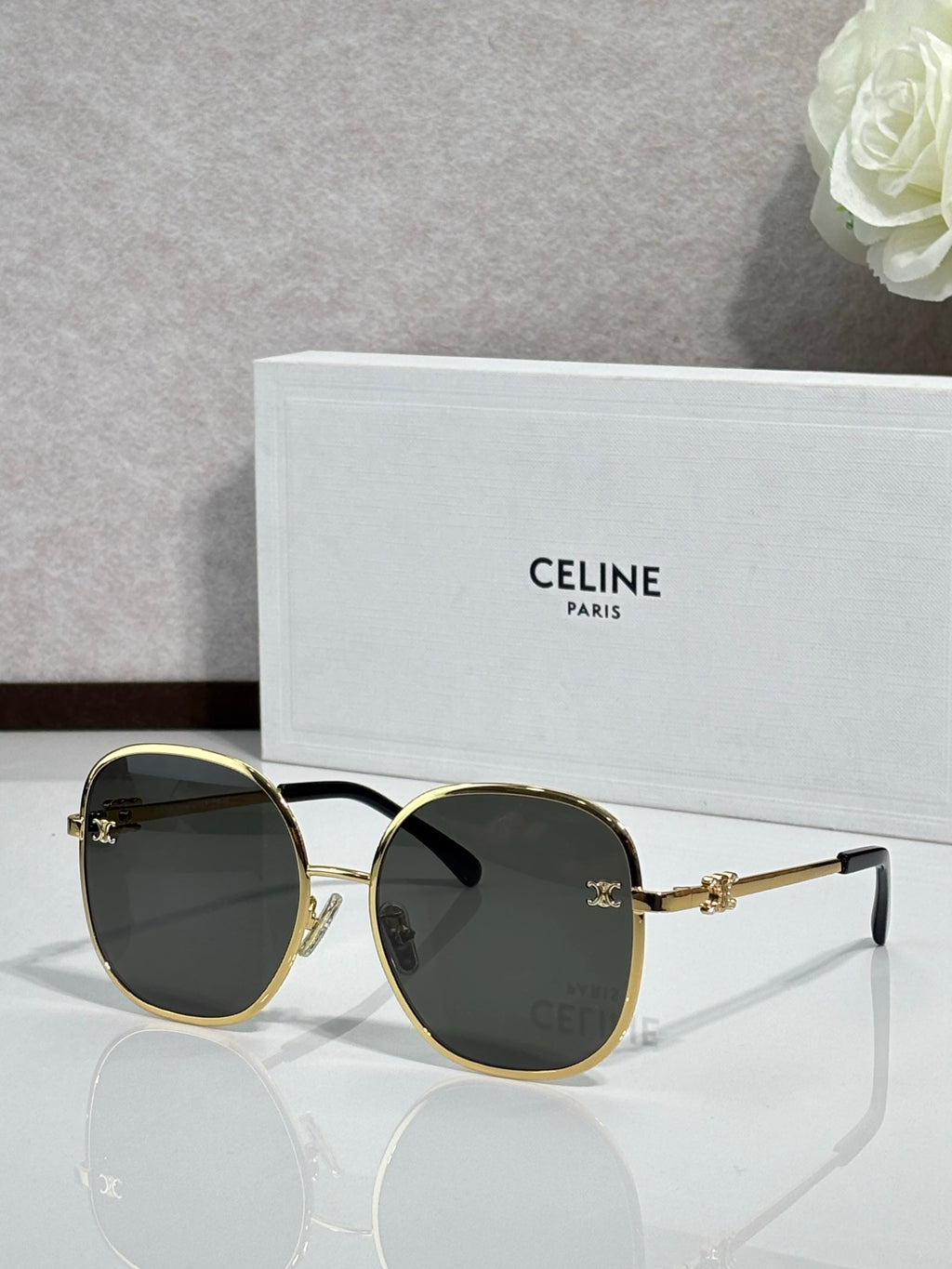 Celine round sunglasses with dark green lenses and gold-tone metal frames