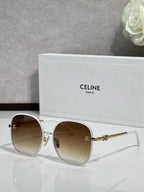 Celine round sunglasses with tan lenses and gold-tone metal frames