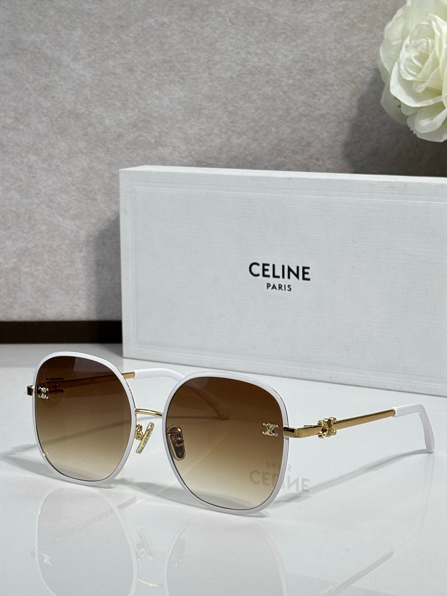 Celine round sunglasses with tan lenses and gold-tone metal frames