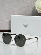 Celine round sunglasses with dark lenses and silver-tone metal frames