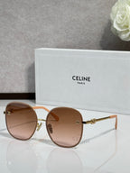 Celine round sunglasses with light brown lenses and gold-tone metal frames