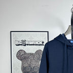 Dark navy hooded zip hoodie with drawstring and chest logo