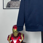 Dark navy hoodie arm and ribbed cuff detail with pocket seam