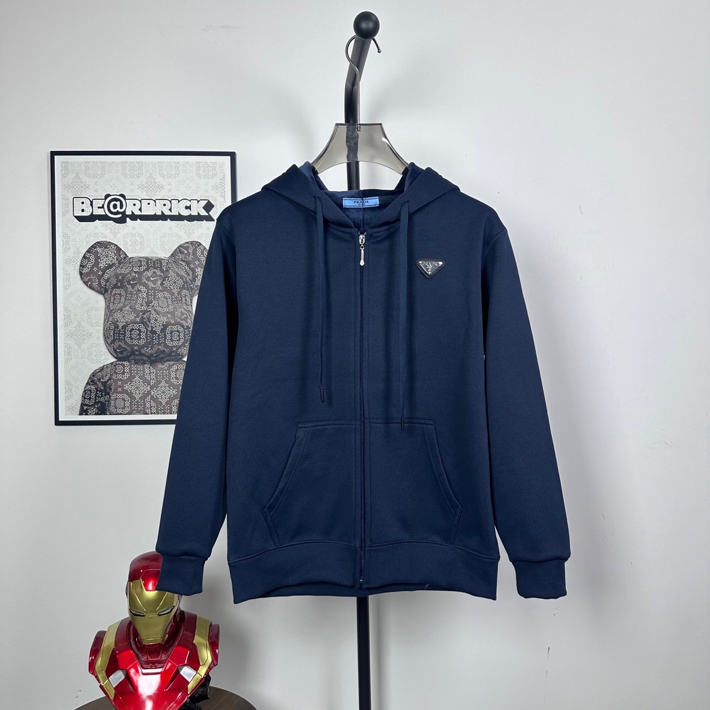 Prada dark navy zip hoodie with hood, drawstrings, and kangaroo pocket