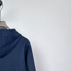 Dark navy hoodie hood opening with drawstring, hanging