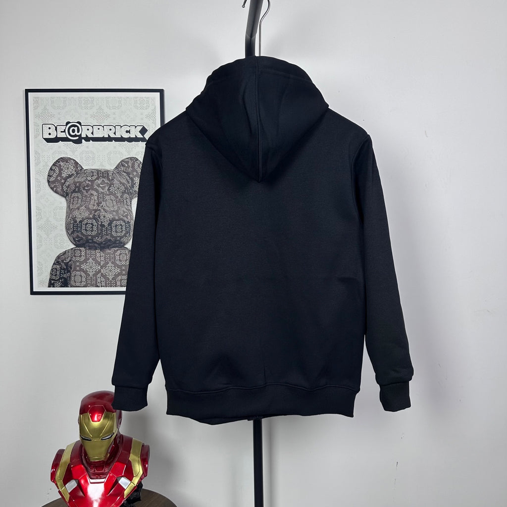 Dark zip-up hoodie, hood up, front zipper with ribbed cuffs
