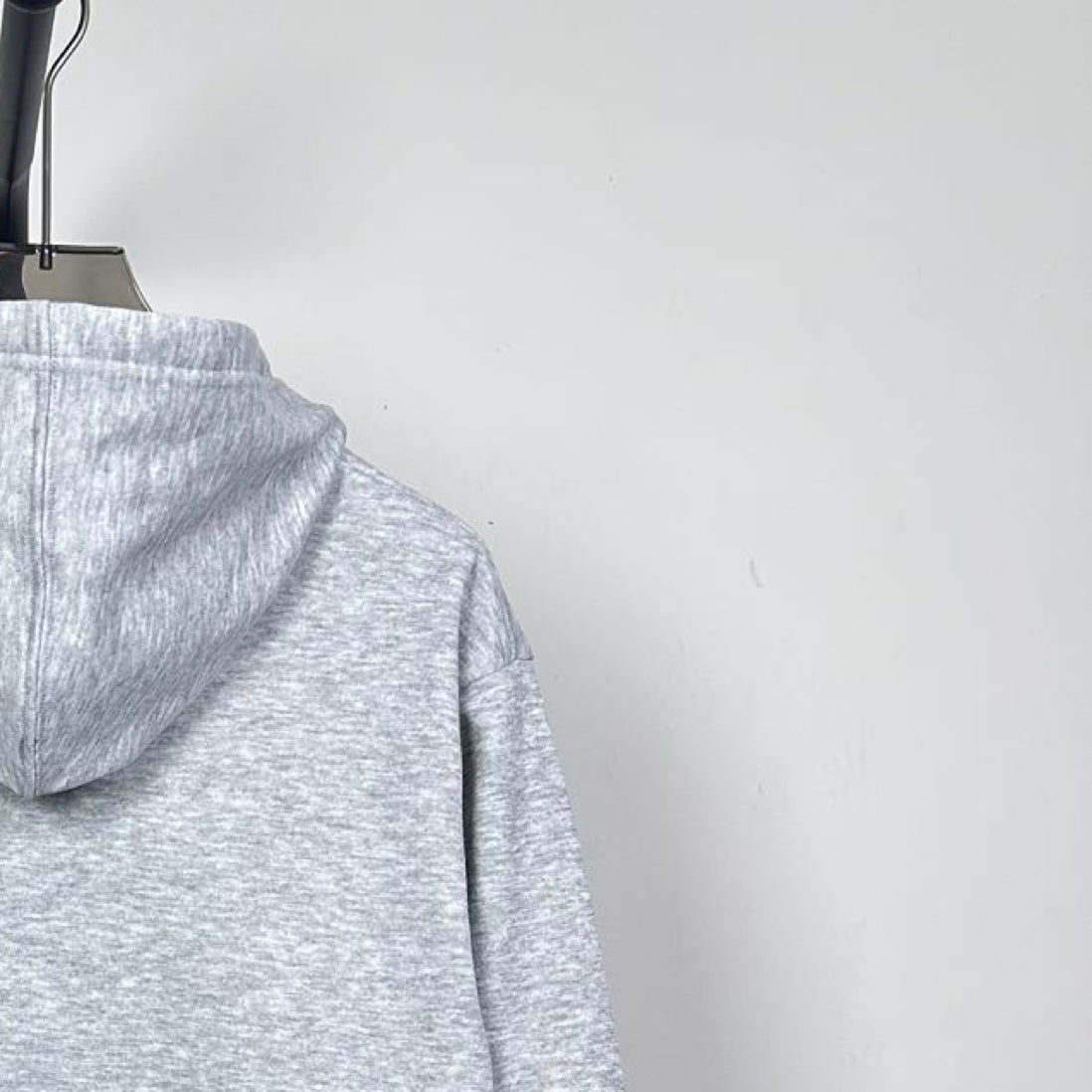 Prada heather gray zip-up hoodie hood and shoulder seam, side close-up