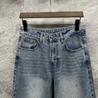 Light blue denim pants front view with waistband and two front pockets