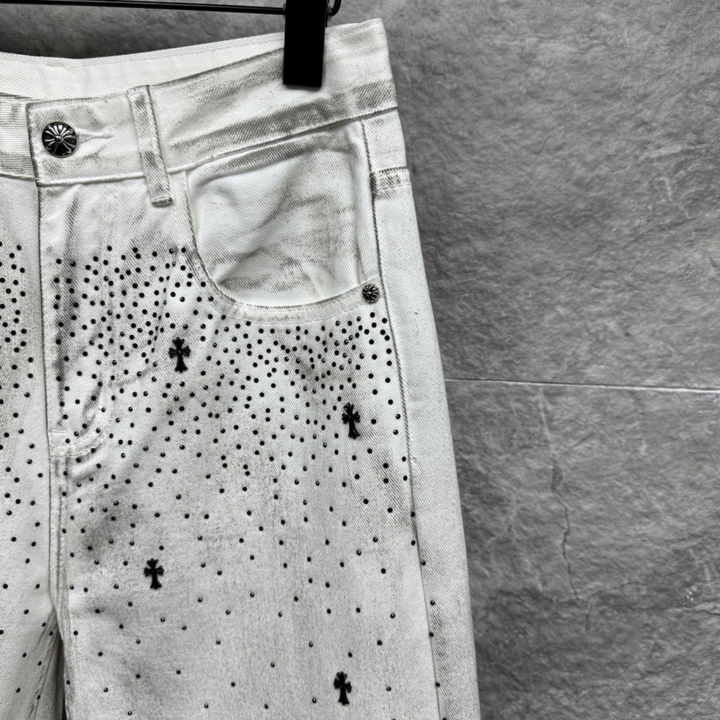 White denim pants with side pocket detail and black dot cross pattern