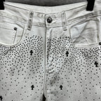 White denim pants with waistband button and black dot cross print