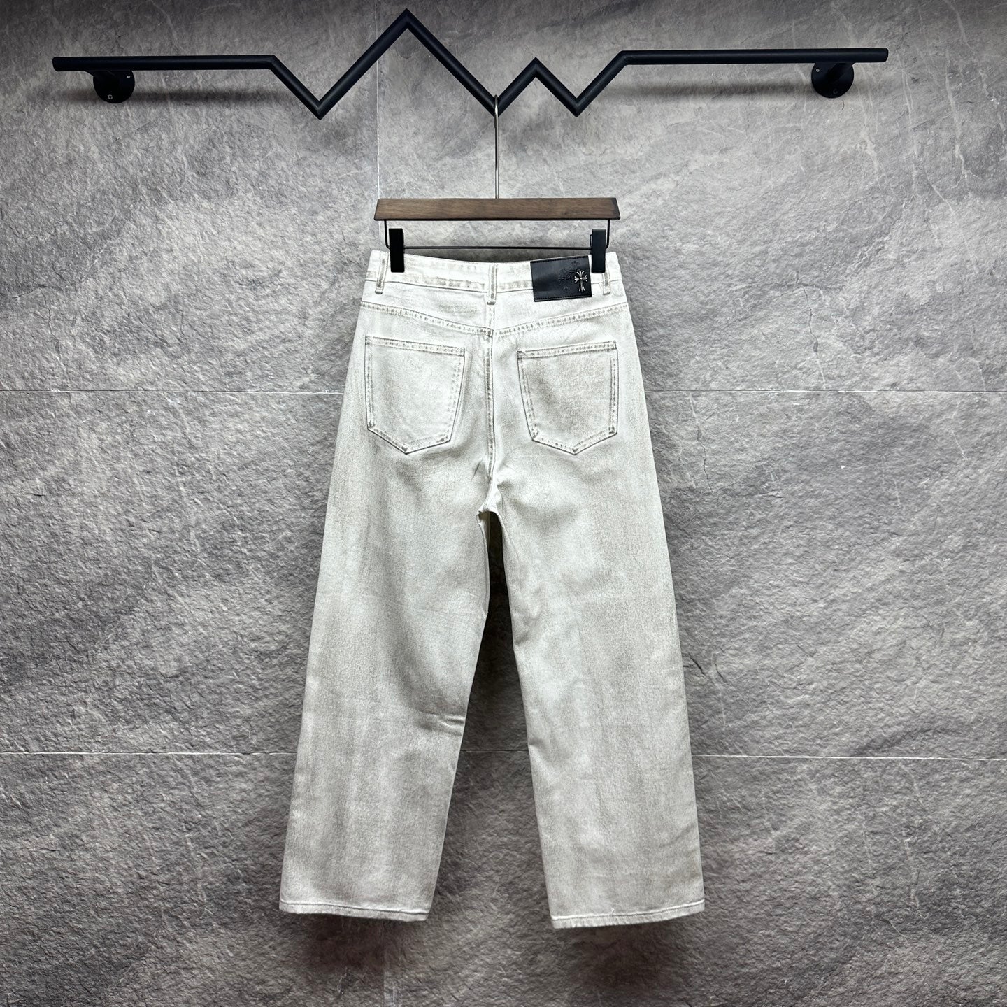 White denim pants with belt loops and front pockets, straight leg