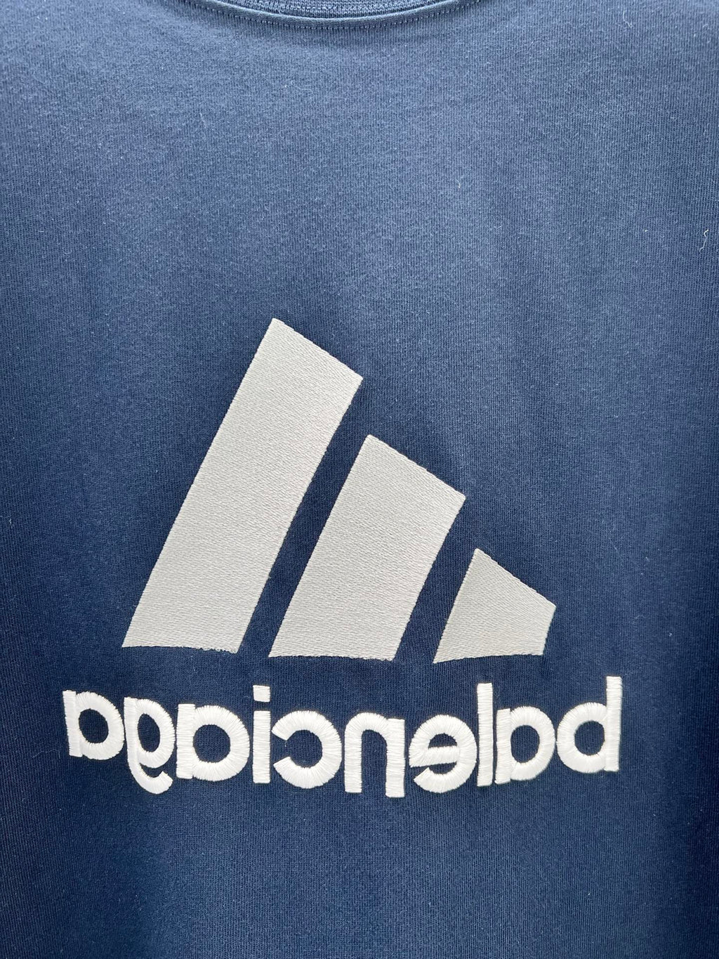 Balenciaga short sleeve T-shirt fabric close-up with large white logo print
