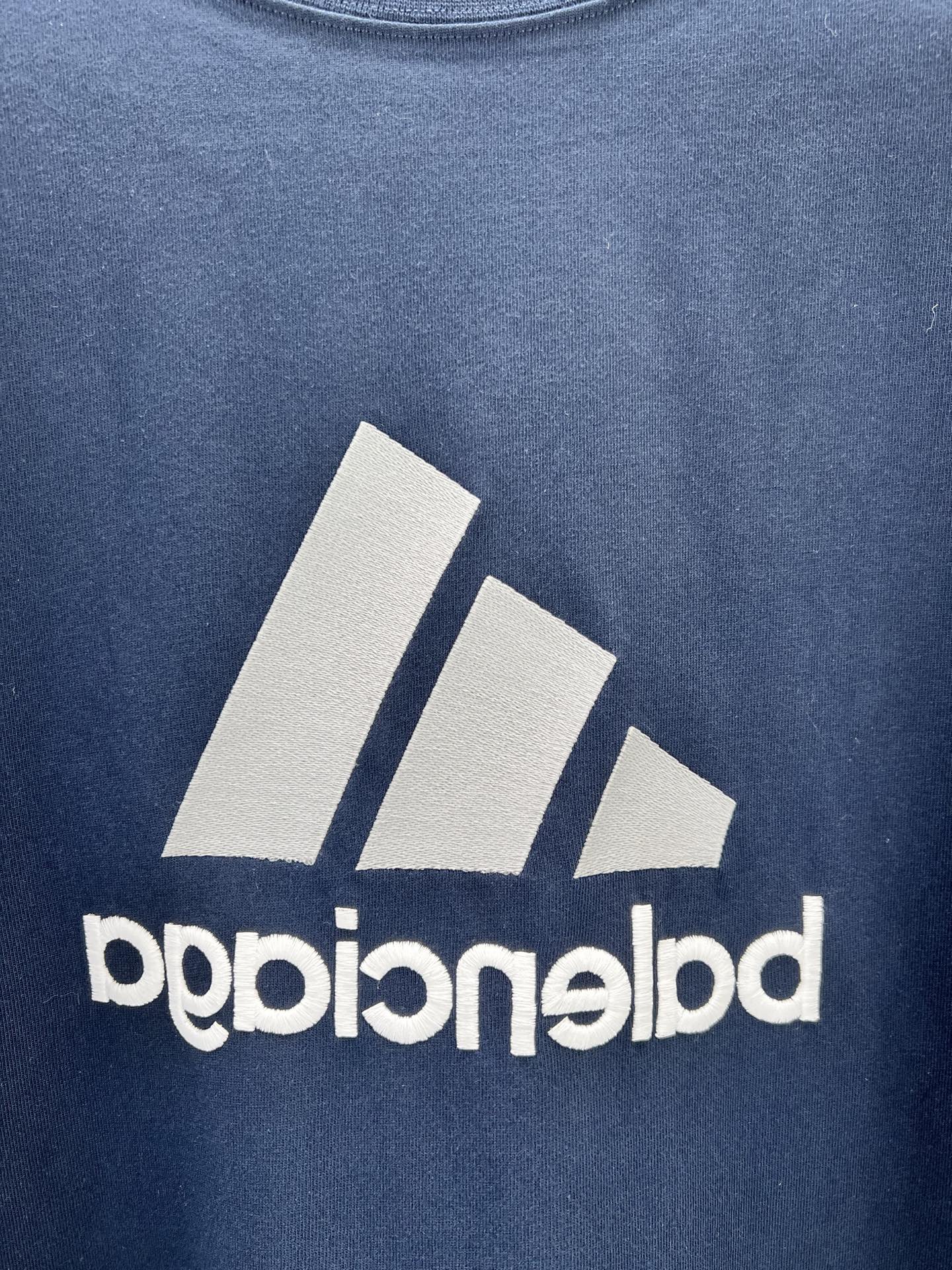 Balenciaga short sleeve T-shirt fabric close-up with large white logo print