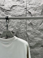 White T-shirt shoulder and upper back view with crew neck