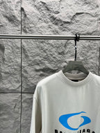 White crew-neck T-shirt with blue Balenciaga logo graphic, close front