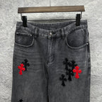 Grey denim pants with cross embroidery on front thighs and side pockets