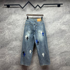 Light-wash denim pants with blue cross patches, back view, wide straight leg