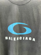 Balenciaga T-shirt close-up of blue G logo and BALENCIAGA lettering