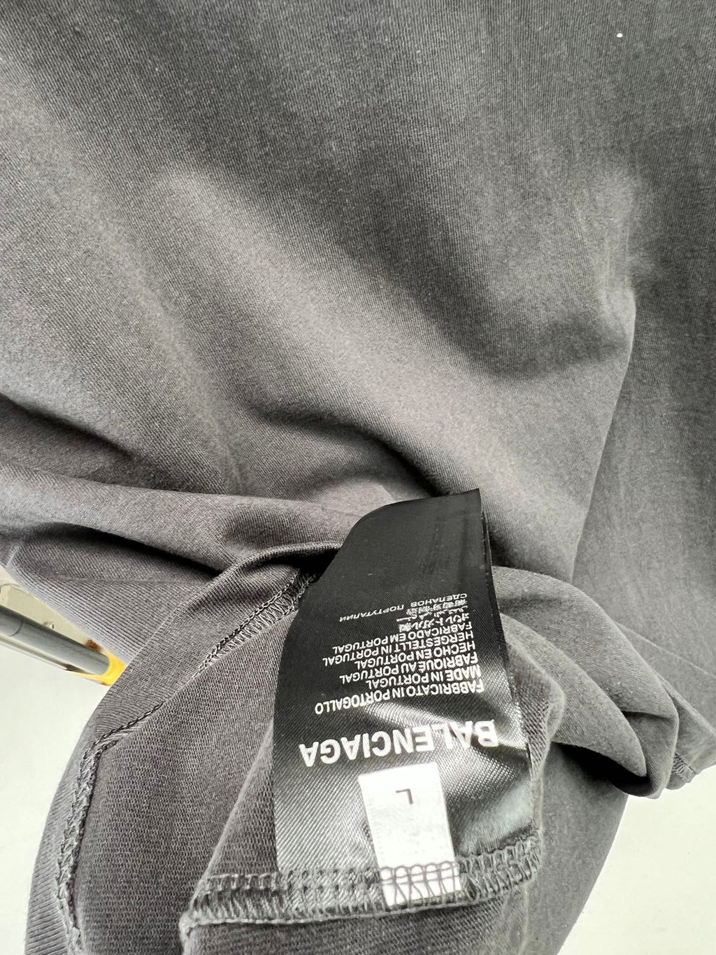Balenciaga T-shirt close-up of heather gray fabric and size tag
