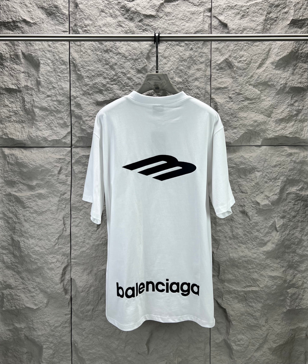 White crew-neck T-shirt with large black back logo print.