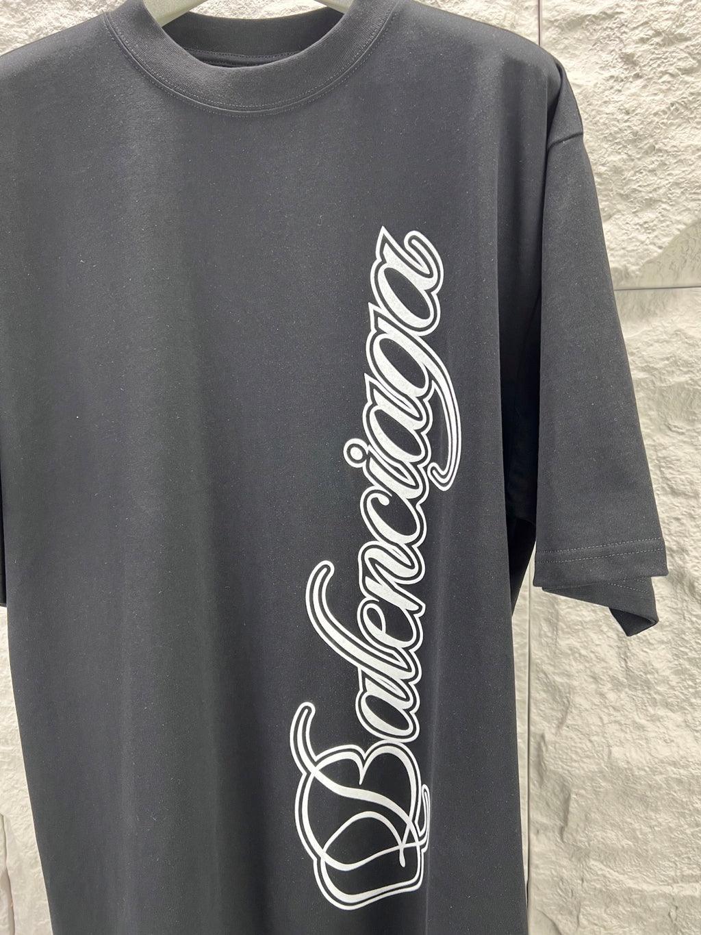 Gray short-sleeve T-shirt with Balenciaga script logo on front