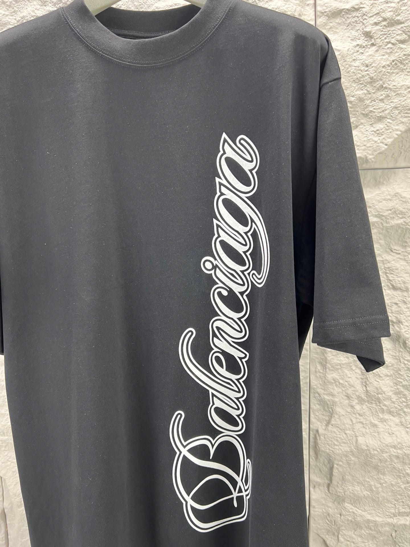 Gray short-sleeve T-shirt with Balenciaga script logo on front