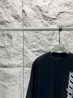 Black crewneck T-shirt with Balenciaga script logo, chest crop