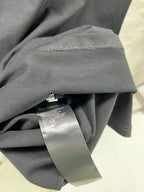 Gray T-shirt fabric with Balenciaga neck label tag detail