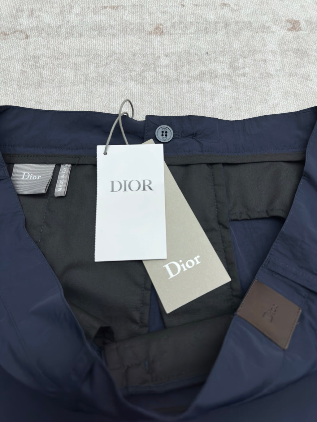 Dior blue short pants with waistband tags and front button closure