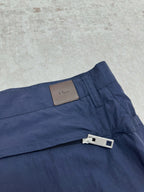 Dior blue short pants with fabric tag label on waistband and zip fly
