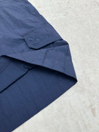 Dior blue short pants with diagonal pocket flap and stitched panels