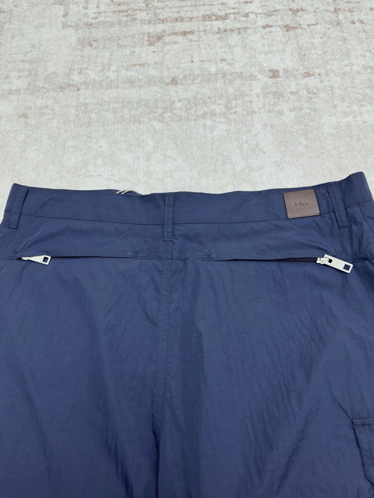 Dior blue short pants with belt loops and front button waistband