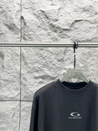 Balenciaga dark navy T-shirt close-up, crew neck and chest logo
