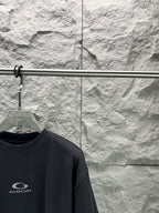 Balenciaga dark navy T-shirt close-up, chest logo on front