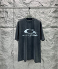 Dark short-sleeve T-shirt with large distressed oval logo graphic at center