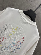 White T-shirt back with large multicolor floral embroidery in raised stitching