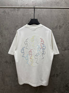 White short-sleeve T-shirt with crew neck and large multicolor floral back embroidery
