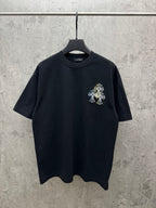 Dark navy short-sleeve T-shirt with small multicolor floral line embroidery on chest