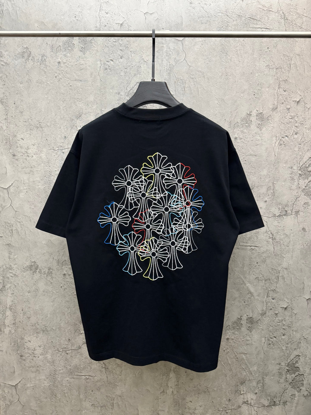 Dark navy short-sleeve T-shirt with large multicolor floral line embroidery on back