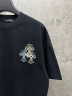 Dark navy short-sleeve T-shirt with small multicolor floral line embroidery on sleeve