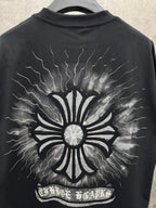 Black short-sleeve T-shirt with full back sunburst flower graphic and lightning lines