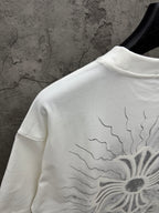 White short-sleeve T-shirt back close-up of sunburst floral print