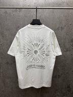 White short-sleeve T-shirt with large back sunburst floral print and banner text