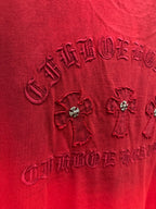 Red T-shirt close-up of back graphic with rhinestone flowers and raised embroidery