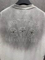 Light gray short-sleeve T-shirt back view with embroidered crest, crosses, and text