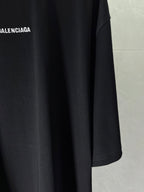 Balenciaga dark navy T-shirt sleeve and hem detail, smooth fabric drape