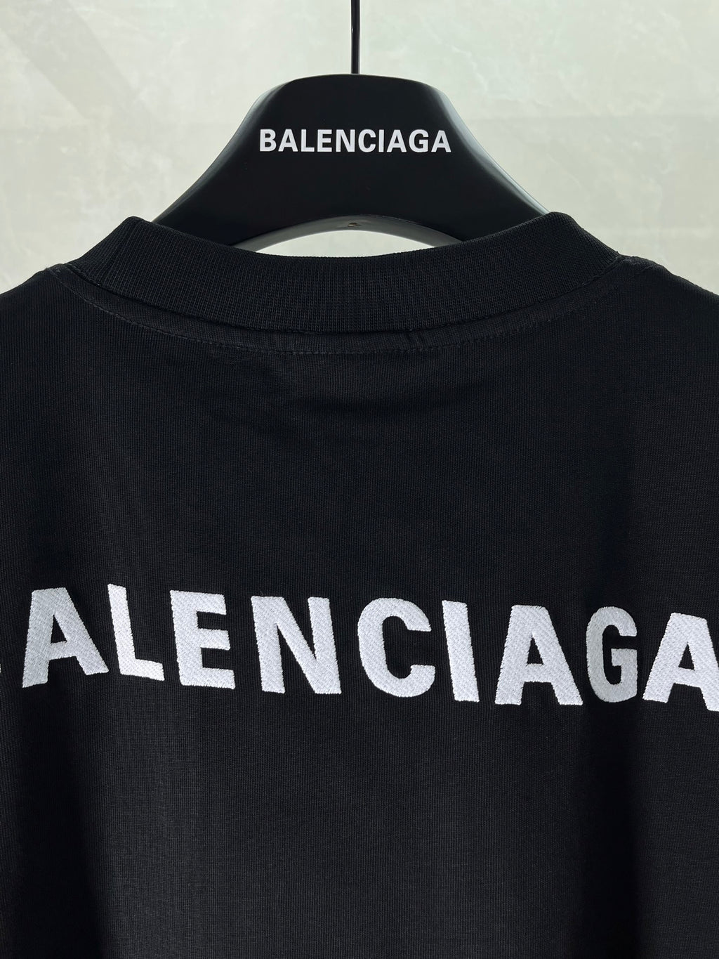 Balenciaga dark navy T-shirt with large ALENCIAGA logo on back